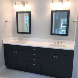Remodeled bathroom counter tops and lighting