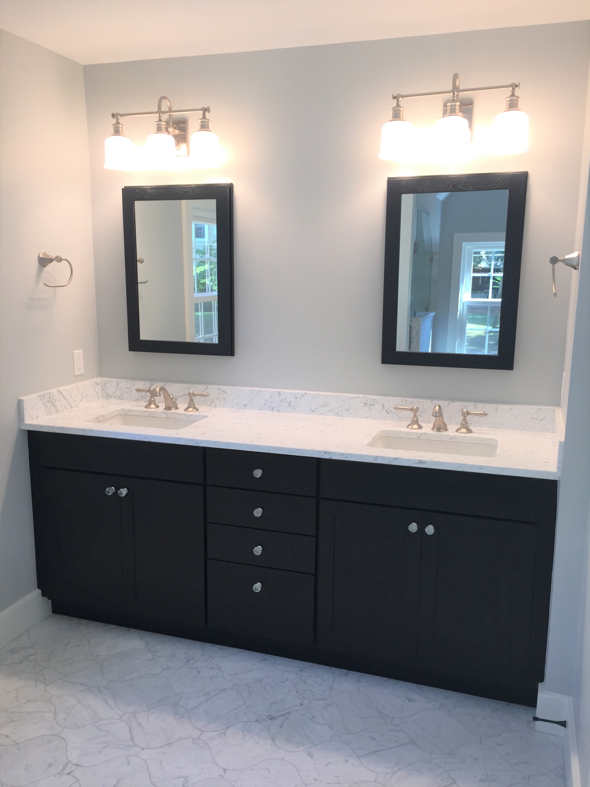 Remodeled bathroom counter tops and lighting