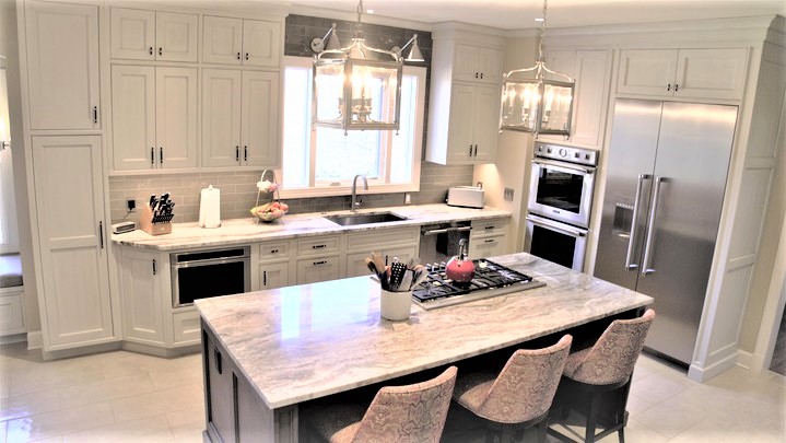 Remodeled white kitchen and marble